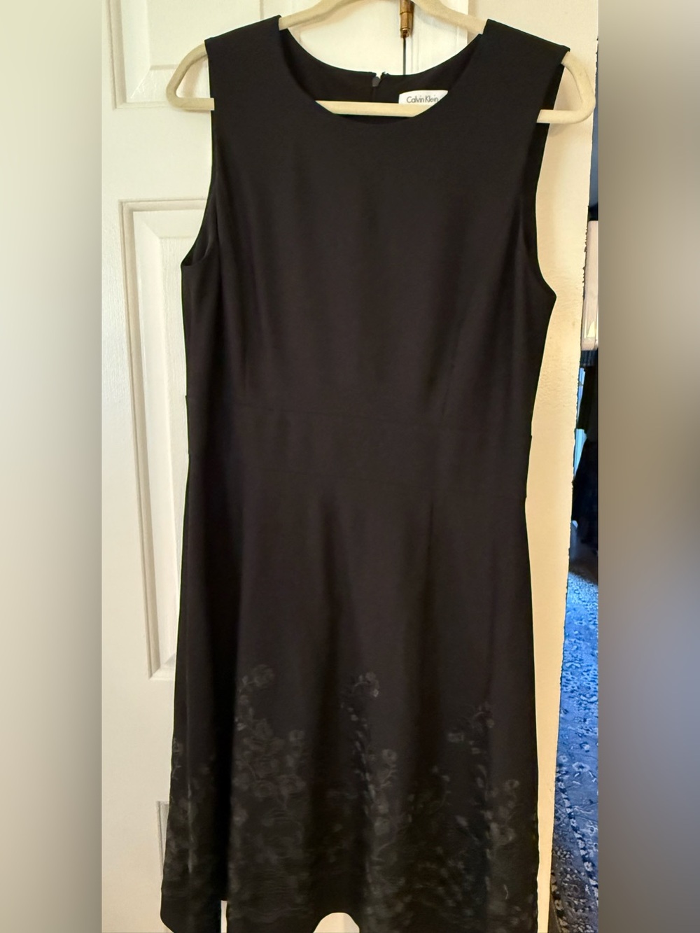 Calvin Klein Black Sleeveless Fit-and-Flare Dress with Subtle Floral Hem